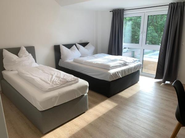 AT-Rooms : photo 1 de la chambre chambre lits jumeaux