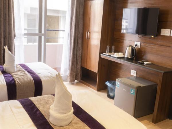 Hotel New Era : photo 6 de la chambre chambre lits jumeaux deluxe