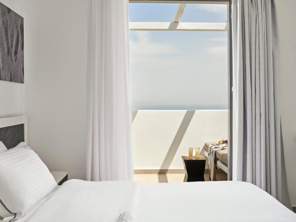 Loizos Stylish Residences : photo 5 de la chambre chambre premium avec baignoire extérieure