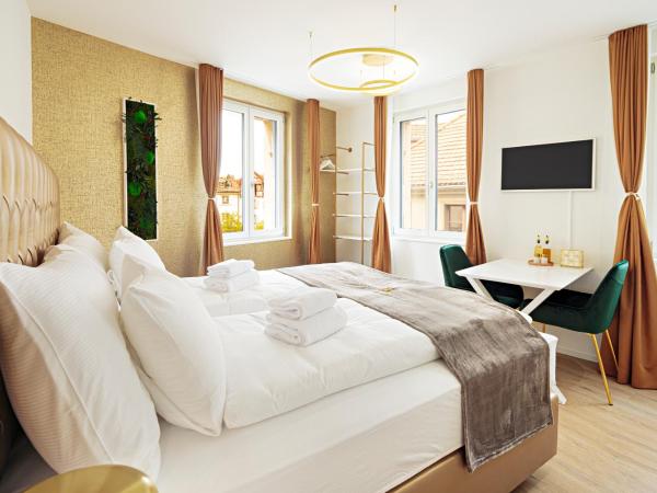 EH Apartments Merkur : photo 1 de la chambre studio lit king-size