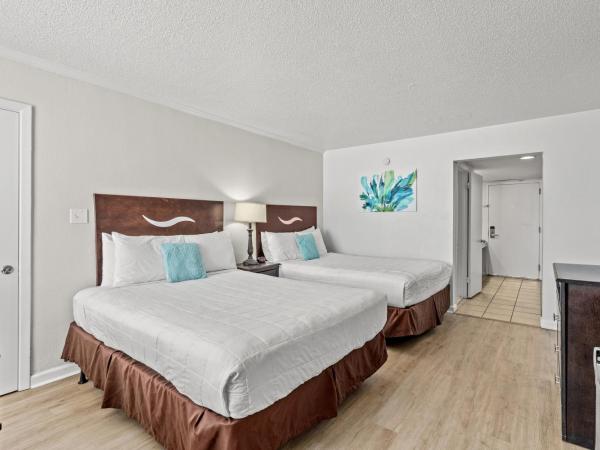 The Reef At Seahaven Beach Resorts : photo 1 de la chambre chambre double avec patio