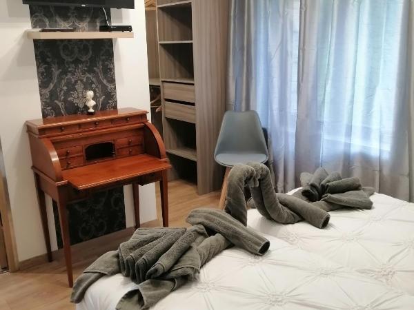 chambres d'hôte le breuil : photo 2 de la chambre chambre lits jumeaux - vue sur jardin