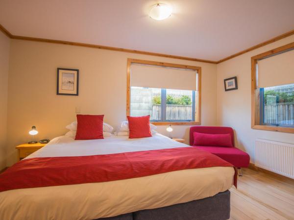 Coronation Lodge : photo 2 de la chambre chambre lit king-size