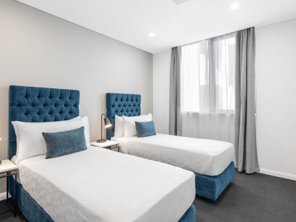 Meriton Suites Coward Street, Mascot : photo 1 de la chambre suite 1 chambre de luxe avec lits jumeaux 