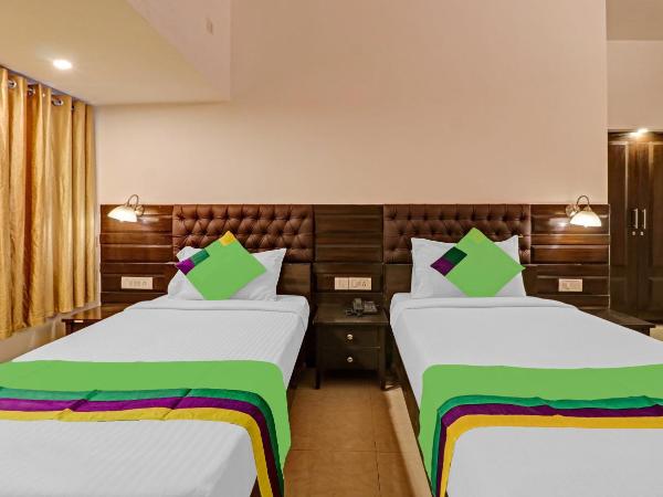 Treebo White Inn Koramangala : photo 10 de la chambre [sanitized] deluxe double room