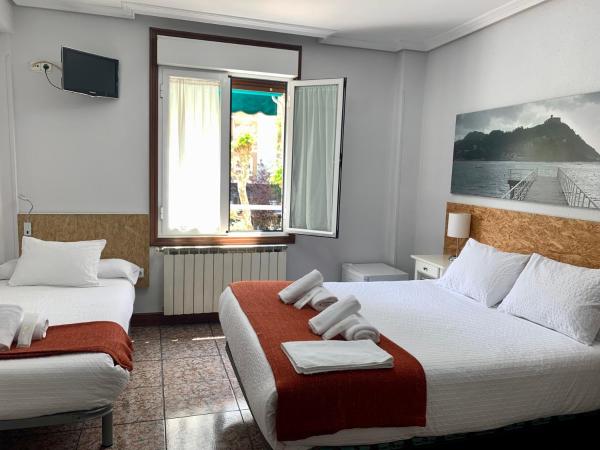 Pensión Amara : photo 4 de la chambre chambre triple