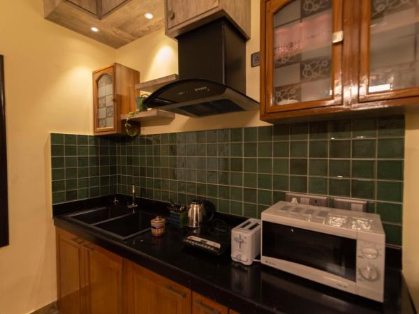 J's Nest : photo 1 de la chambre studio lit queen-size de luxe