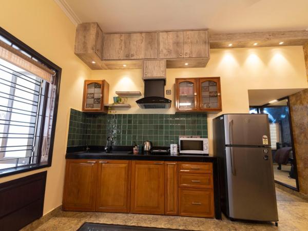 J's Nest : photo 3 de la chambre studio lit queen-size de luxe