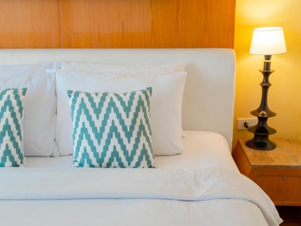 Pinnacle Lumpinee Park Hotel : photo 3 de la chambre chambre double ou lits jumeaux pinnacle