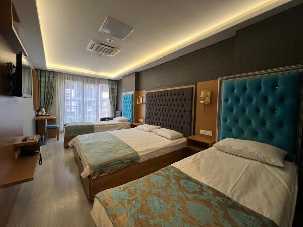 Grand Palace Hotel : photo 5 de la chambre chambre quadruple deluxe