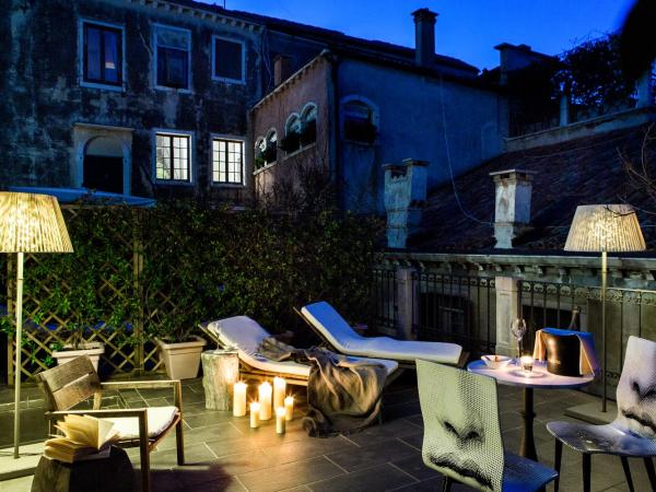 Palazzina Grassi : photo 5 de la chambre chambre double deluxe avec terrasse