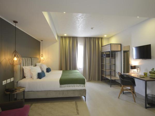 MAIA HOTEL SUITES : photo 1 de la chambre chambre lits jumeaux