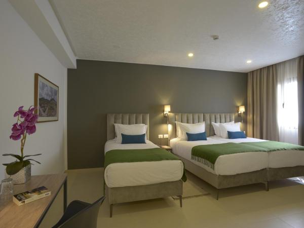 MAIA HOTEL SUITES : photo 1 de la chambre chambre triple