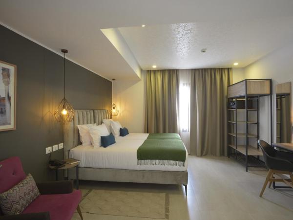 MAIA HOTEL SUITES : photo 5 de la chambre chambre lits jumeaux