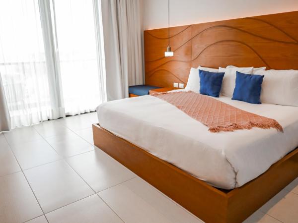 Hotel Puerto Libre : photo 3 de la chambre chambre lit king-size standard