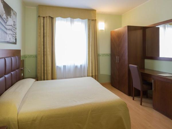 Hotel Terminus & Plaza : photo 3 de la chambre chambre lits jumeaux