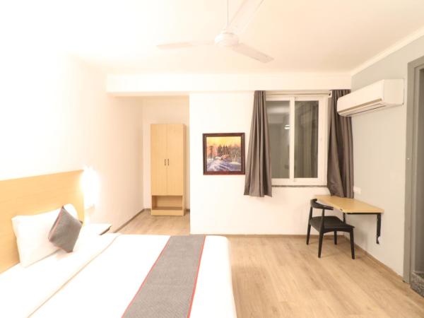 Flora Residency : photo 10 de la chambre chambre double ou lits jumeaux