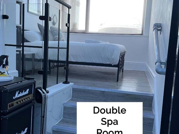 Seafront419 By Seafront Collection : photo 1 de la chambre chambre double avec baignoire spa