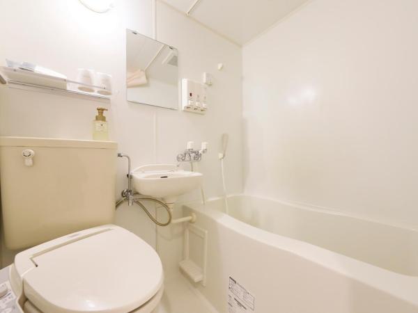 Hotel Famy Inn Kinshicho : photo 6 de la chambre chambre lits jumeaux avec salle de bains