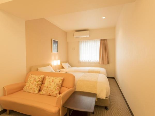 Hotel Famy Inn Kinshicho : photo 8 de la chambre chambre lits jumeaux avec salle de bains