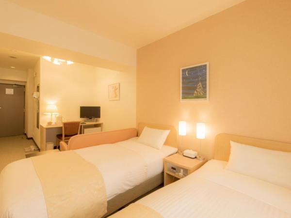 Hotel Famy Inn Kinshicho : photo 7 de la chambre chambre lits jumeaux avec salle de bains