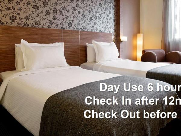 Strand Hotel : photo 1 de la chambre utilisation en journée - chambre lits jumeaux deluxe de midi à 18h00 (6 heures) 