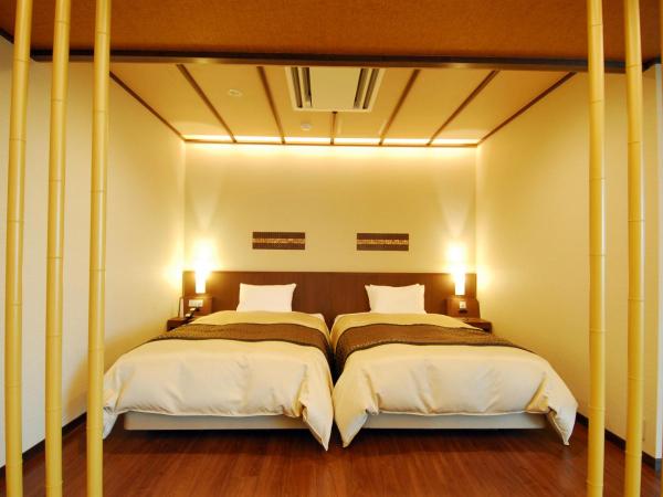 Arima Onsen Taketoritei Maruyama : photo 7 de la chambre chambre lits jumeaux deluxe avec coin tatami et bain thermal - non-fumeurs - 203
