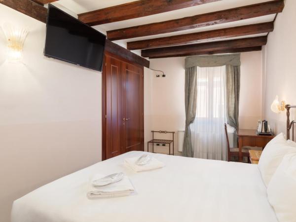 La Locandiera : photo 10 de la chambre chambre double ou lits jumeaux supérieure