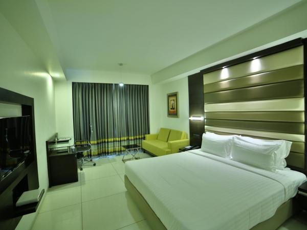 HOTEL G EXPRESS Formerly Known as TGB Express : photo 3 de la chambre deluxe room (locals and unmarried couples are not allowed)