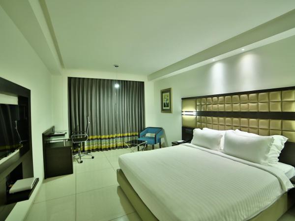 HOTEL G EXPRESS Formerly Known as TGB Express : photo 4 de la chambre deluxe room (locals and unmarried couples are not allowed)