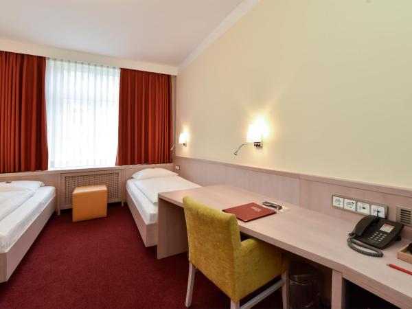 Hotel ADRIA München : photo 1 de la chambre chambre lits jumeaux