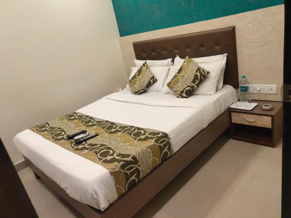 Hotel Golden Nest Popular Residency : photo 9 de la chambre chambre double deluxe
