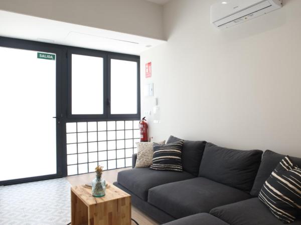 FLORIT FLATS - The Serreria Rooms : photo 2 de la chambre chambre familiale adaptée aux personnes à mobilité réduite