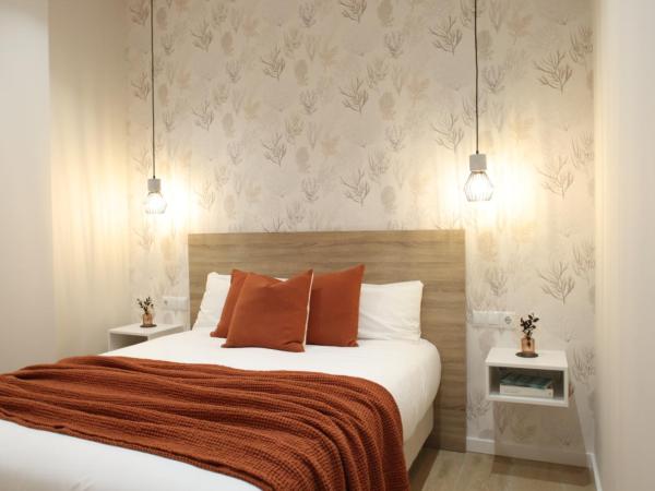 FLORIT FLATS - The Serreria Rooms : photo 10 de la chambre chambre familiale adaptée aux personnes à mobilité réduite