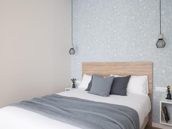 FLORIT FLATS - The Serreria Rooms : photo 10 de la chambre chambre triple confort