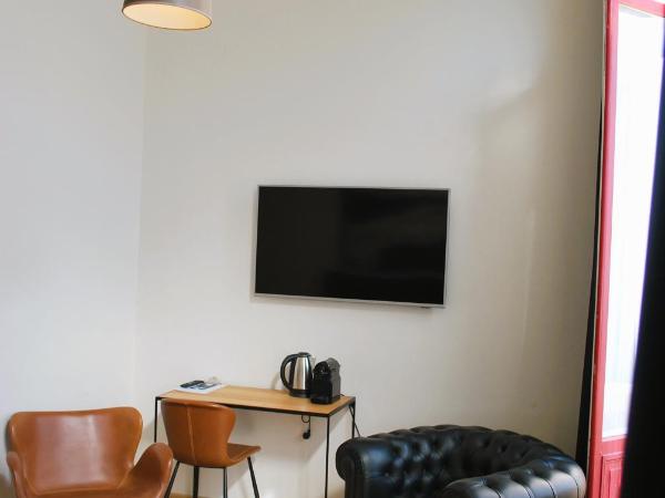 Hotel Le Parisien : photo 2 de la chambre grande chambre double