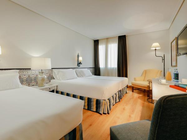 Hesperia Córdoba : photo 1 de la chambre chambre double avec lit d'appoint