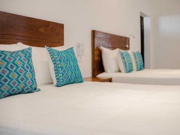 Na Balam Hotel : photo 8 de la chambre hébergement double standard avec 2 lits doubles - côté piscine