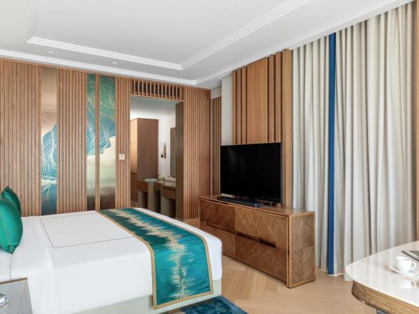 Taj Exotica Resort & Spa, The Palm, Dubai : photo 6 de la chambre grande suite 2 chambres de luxe avec accès au salon club, goûter et cocktails en soirée - vue sur mer