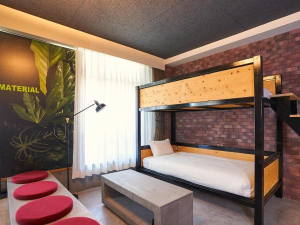 Material : photo 5 de la chambre chambre familiale avec baignoire