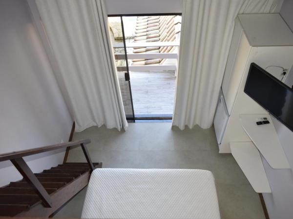 Pousada Sweet Home : photo 10 de la chambre chambre familiale supérieure