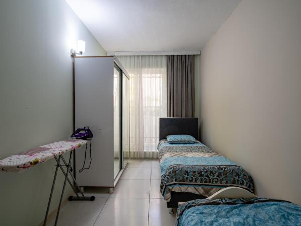 Sare Suites Downtown : photo 10 de la chambre appartement 2 chambres - sous-sol