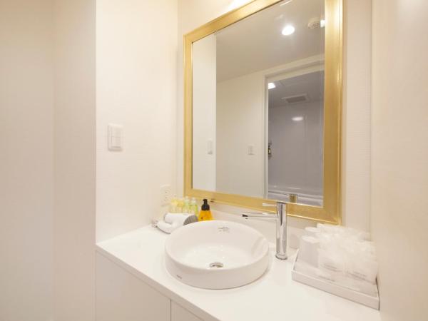 Centurion Hotel Grand Akasakamitsuke Station : photo 6 de la chambre chambre lits jumeaux de luxe - non-fumeurs - annexe