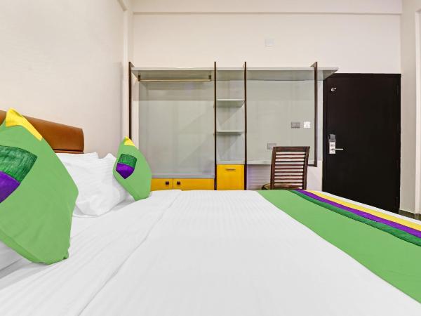 Treebo Grand Vistara Airport Suites : photo 3 de la chambre chambre double standard