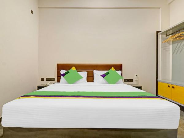 Treebo Grand Vistara Airport Suites : photo 4 de la chambre chambre double standard