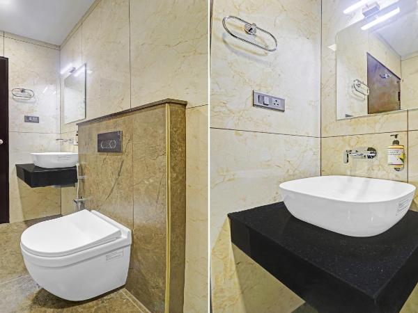 Treebo Grand Vistara Airport Suites : photo 6 de la chambre chambre double standard