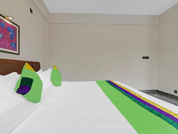 Treebo Grand Vistara Airport Suites : photo 4 de la chambre chambre double supérieure