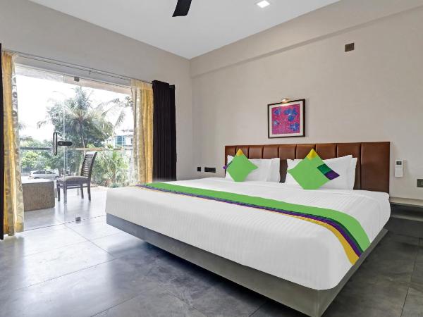 Treebo Grand Vistara Airport Suites : photo 3 de la chambre chambre double supérieure