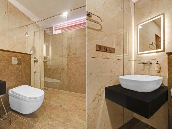 Treebo Grand Vistara Airport Suites : photo 2 de la chambre chambre double supérieure