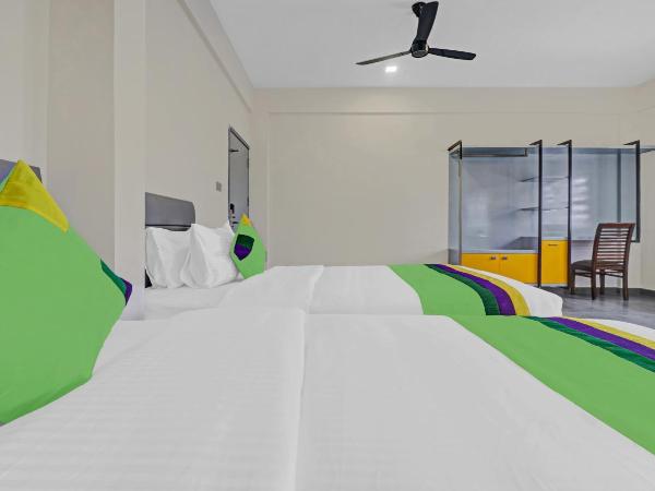 Treebo Grand Vistara Airport Suites : photo 8 de la chambre chambre double supérieure